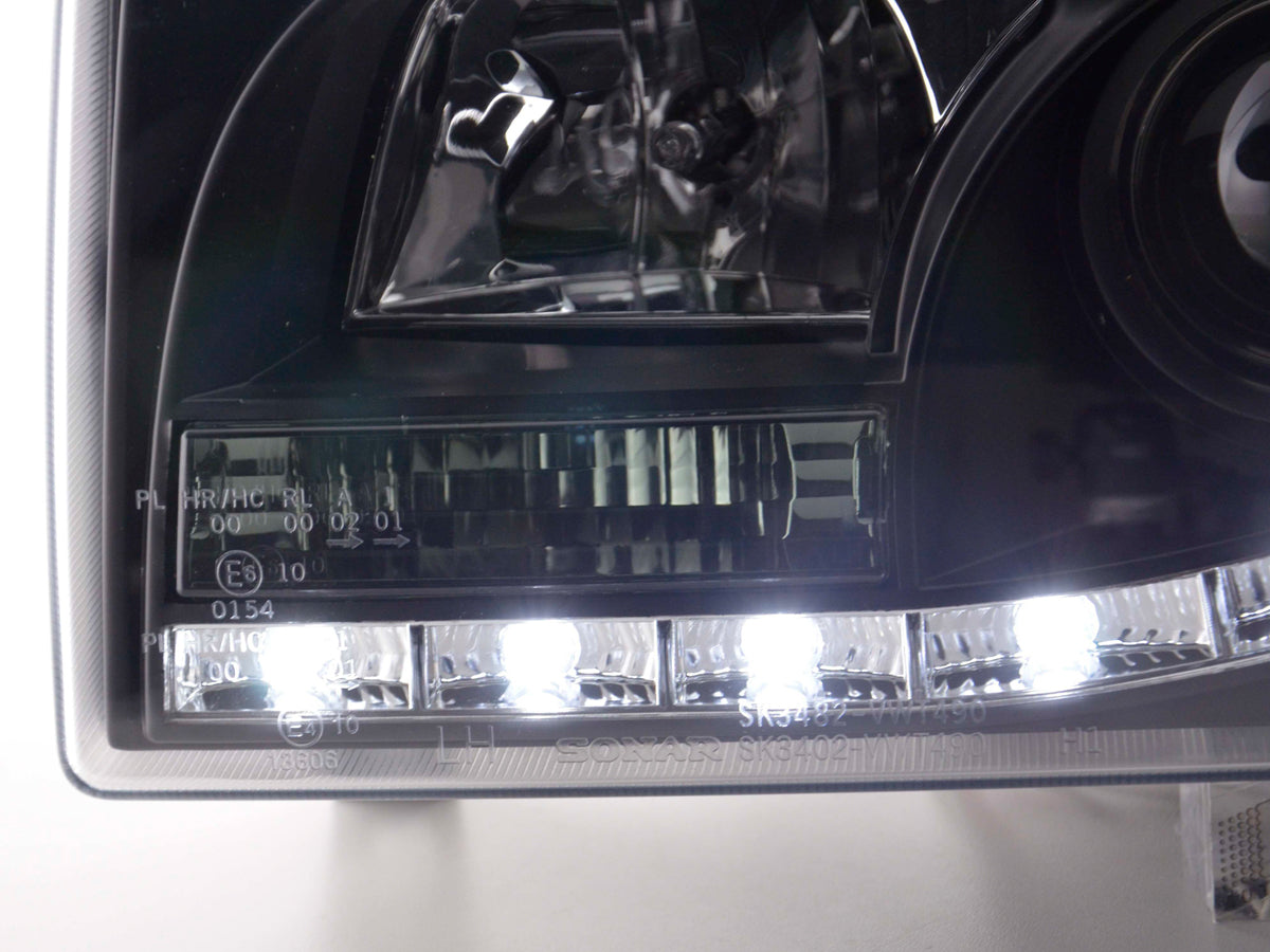 Scheinwerfer Set Daylight LED Tagfahrlicht VW Bus T4 90-96 schwarz Scheinwerfer Set Daylight LED Tagfahrlicht VW Bus T4 90-96 schwarz